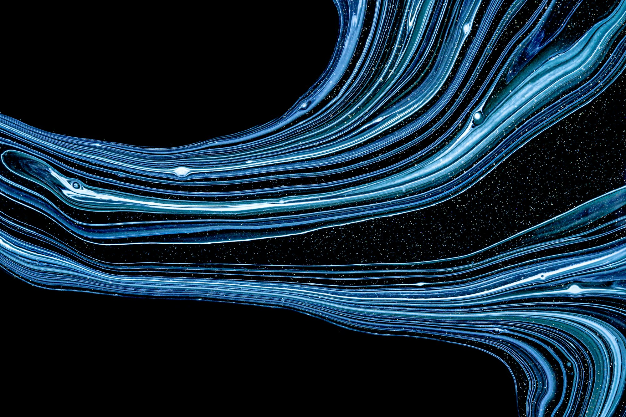 Long-exposure light streaks suggesting fast flow
